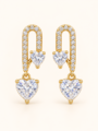Gold-tone heart drop earrings with sparkling clear stones, featuring a crystal-studded U-shaped design and two heart-shaped gems.